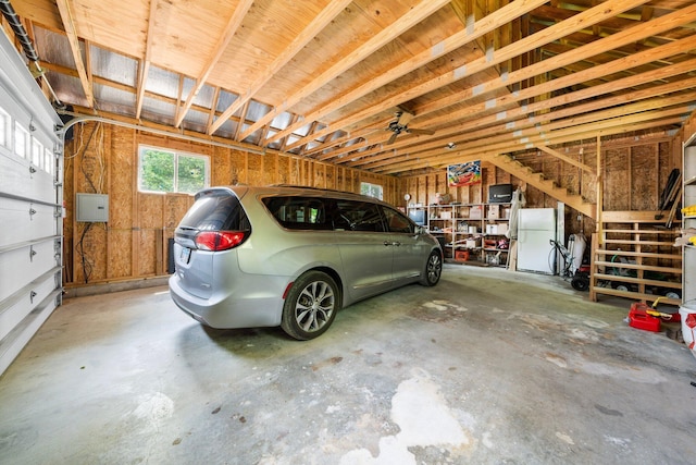 61738 Lake View Dr, Cassopolis, MI 49031 - garage featuring freestanding refrigerator and a ceiling fan