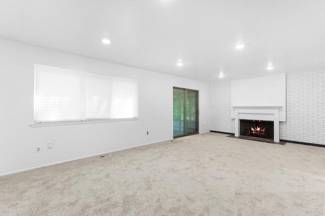 29848 Rambling Rd, Southfield, MI 48076 - unfurnished living room featuring a fireplace with flush hearth, carpet flooring, recessed lighting, and baseboards