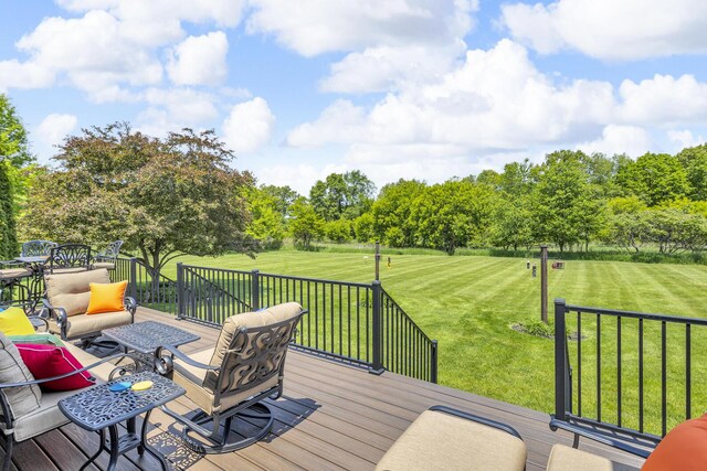 10575 Darrel Dr, Hanover, MI 49241 - deck featuring a yard, an outdoor living space, and view of wooded area