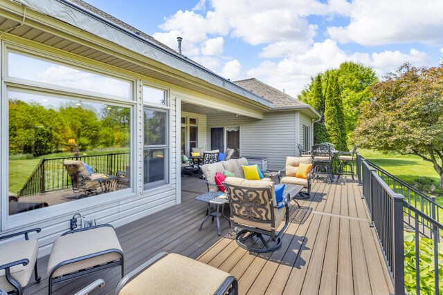 10575 Darrel Dr, Hanover, MI 49241 - deck with outdoor dining area and an outdoor hangout area
