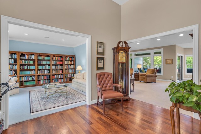 10575 Darrel Dr, Hanover, MI 49241 - sitting room with a towering ceiling, baseboards, recessed lighting, wood finished floors, and ornamental molding