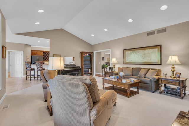 10575 Darrel Dr, Hanover, MI 49241 - living room with recessed lighting, baseboards, light carpet, and high vaulted ceiling