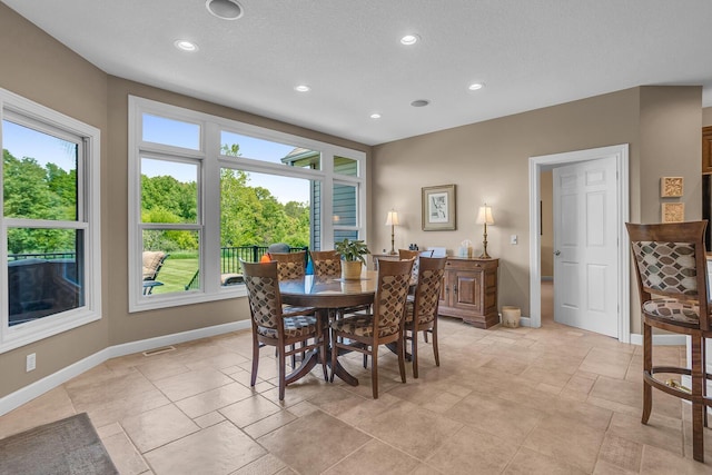 10575 Darrel Dr, Hanover, MI 49241 - dining room featuring baseboards, recessed lighting, and stone tile flooring