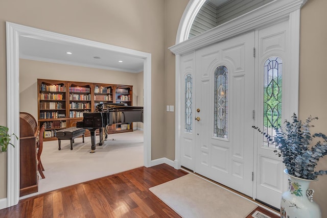 10575 Darrel Dr, Hanover, MI 49241 - foyer with ornamental molding, wood finished floors, recessed lighting, and baseboards
