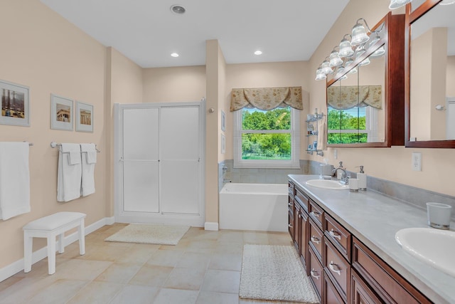 10575 Darrel Dr, Hanover, MI 49241 - bathroom with double vanity, a garden tub, and baseboards
