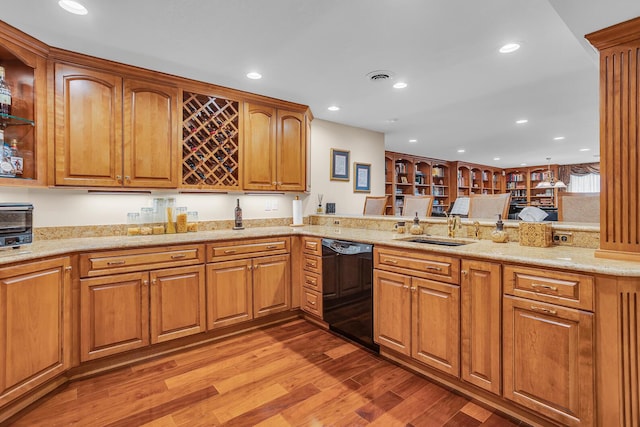10575 Darrel Dr, Hanover, MI 49241 - kitchen featuring dishwasher, light wood finished floors, light stone counters, a sink, and recessed lighting