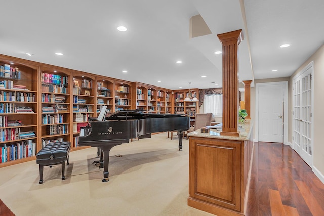 10575 Darrel Dr, Hanover, MI 49241 - living area featuring ornate columns, recessed lighting, and wood finished floors