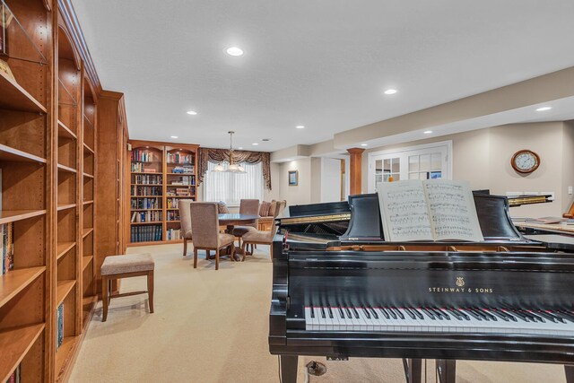 10575 Darrel Dr, Hanover, MI 49241 - sitting room featuring recessed lighting, light carpet, and a chandelier