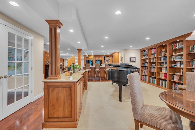 10575 Darrel Dr, Hanover, MI 49241 - game room with decorative columns, recessed lighting, light wood-type flooring, baseboards, and bar area