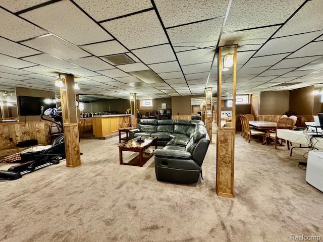 4871 Bayleaf Dr, Sterling Heights, MI 48314 - living area featuring carpet and wooden walls