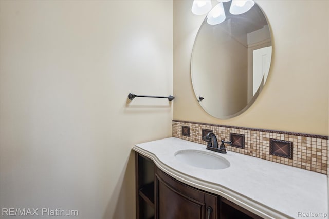 4300 Hampton Ridge Blvd, Howell, MI 48843 - bathroom featuring tasteful backsplash and vanity