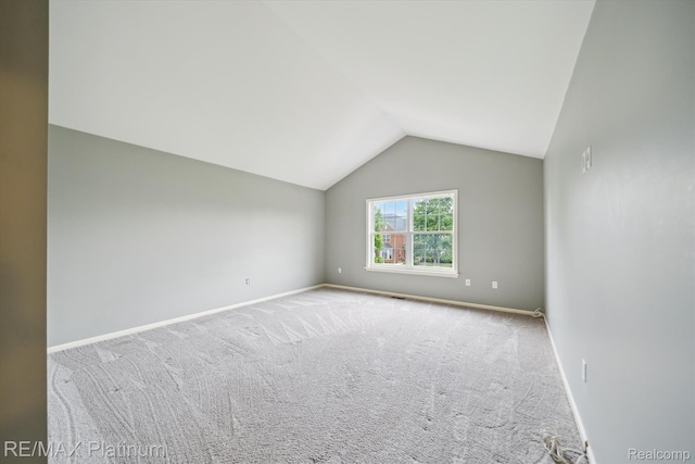 4300 Hampton Ridge Blvd, Howell, MI 48843 - bonus room featuring lofted ceiling, carpet floors, and baseboards
