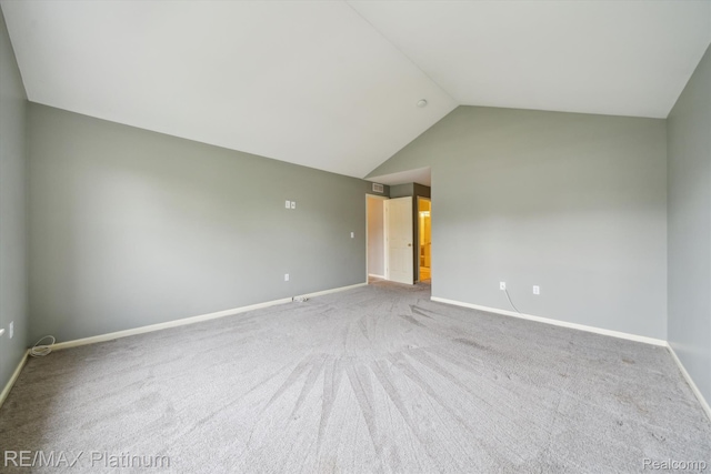 4300 Hampton Ridge Blvd, Howell, MI 48843 - empty room featuring lofted ceiling, baseboards, and carpet flooring