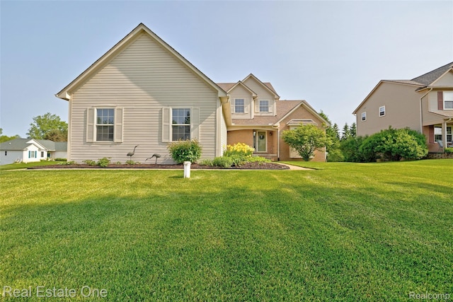 2338 Malena Ln, Oxford, MI 48371 - view of front of house with a front yard and brick siding