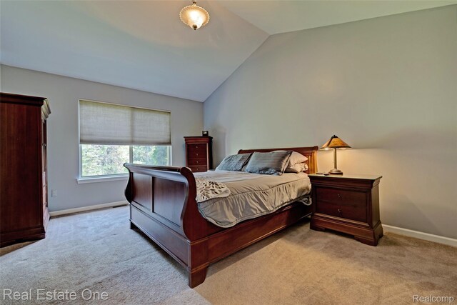 2338 Malena Ln, Oxford, MI 48371 - bedroom featuring carpet flooring, lofted ceiling, and baseboards