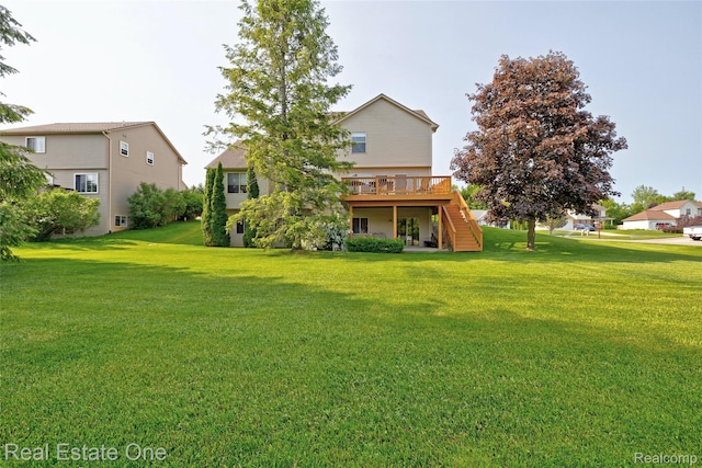 2338 Malena Ln, Oxford, MI 48371 - rear view of property with stairway, a deck, and a yard