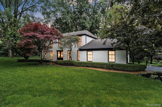 5341 Forest Way, Ferndale, MI 48302 - view of front of property featuring a front lawn, brick siding, and a shingled roof