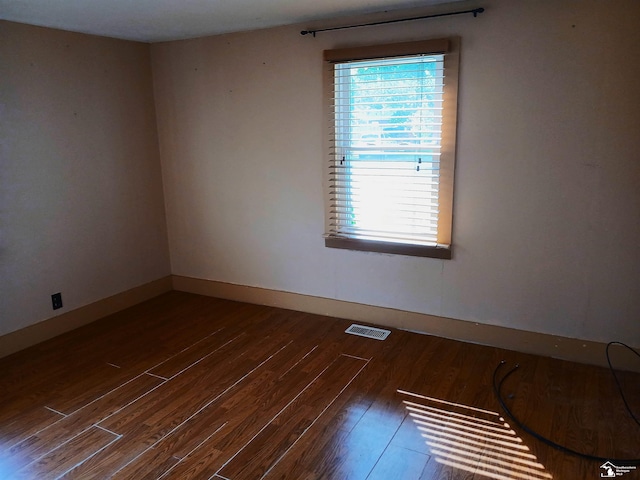 15330 Dayton Rd, Monroe, MI 48161 - empty room featuring wood finished floors and baseboards