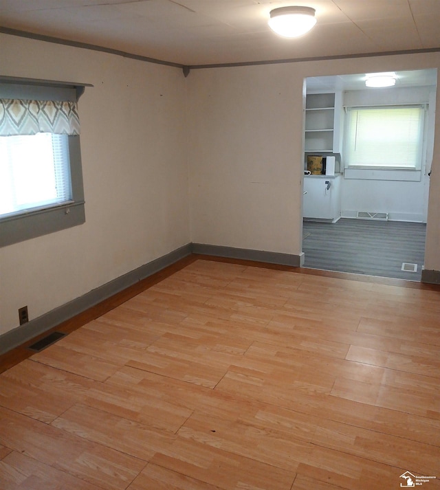 15330 Dayton Rd, Monroe, MI 48161 - spare room with wood finished floors and baseboards