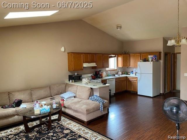 4110 W Cristina Ct S Unit 32, Warren, MI 48091 - living room with dark wood-style flooring, high vaulted ceiling, and a chandelier