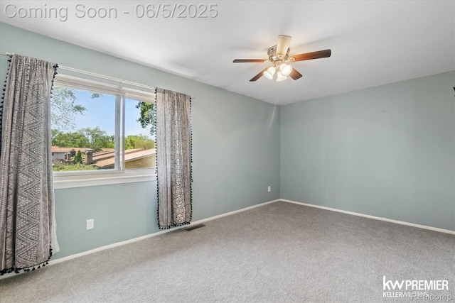 77 Willow Way Unit 13, Waterford, MI 48328 - spare room with carpet, a ceiling fan, and baseboards