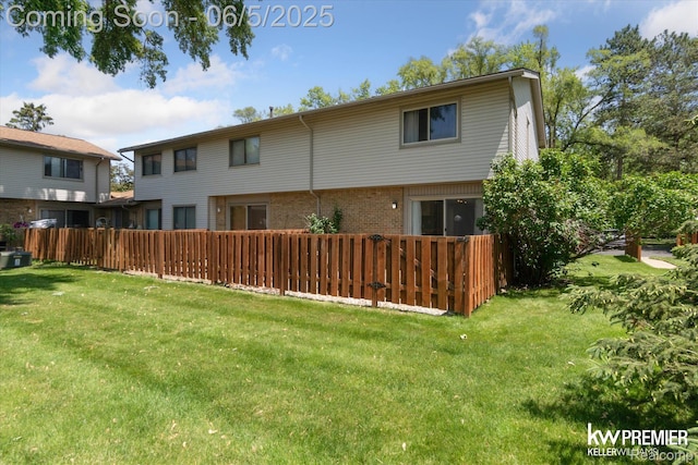 77 Willow Way Unit 13, Waterford, MI 48328 - rear view of property featuring brick siding