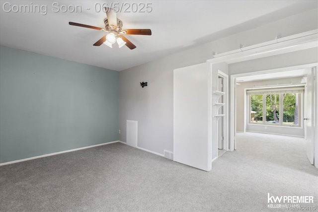77 Willow Way Unit 13, Waterford, MI 48328 - empty room featuring ceiling fan, carpet, and baseboards