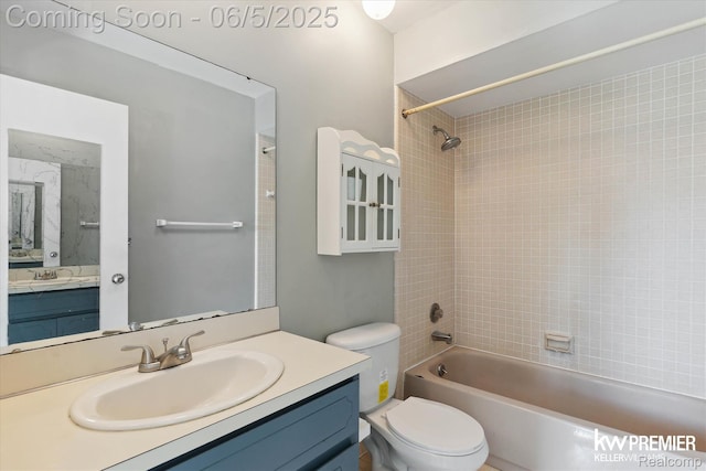 77 Willow Way Unit 13, Waterford, MI 48328 - bathroom featuring bathtub / shower combination, toilet, and vanity
