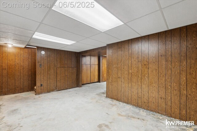 77 Willow Way Unit 13, Waterford, MI 48328 - finished basement featuring wooden walls and a paneled ceiling