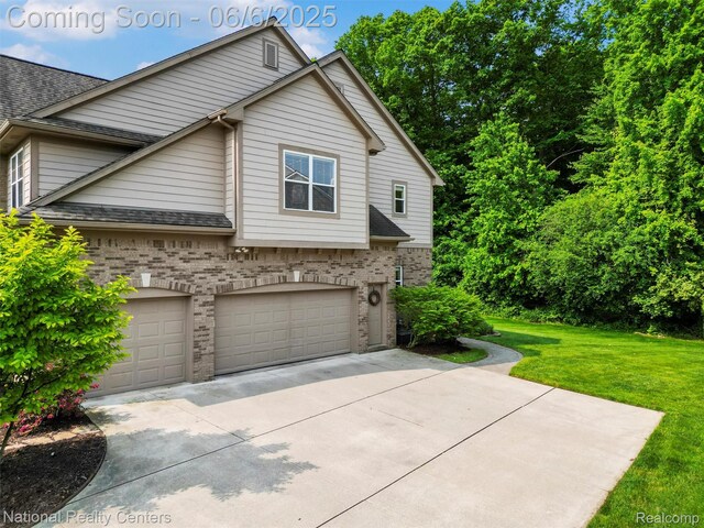 3924 High Grove Way, Lake Orion, MI 48360 - view of property exterior featuring a garage, brick siding, driveway, a yard, and a shingled roof