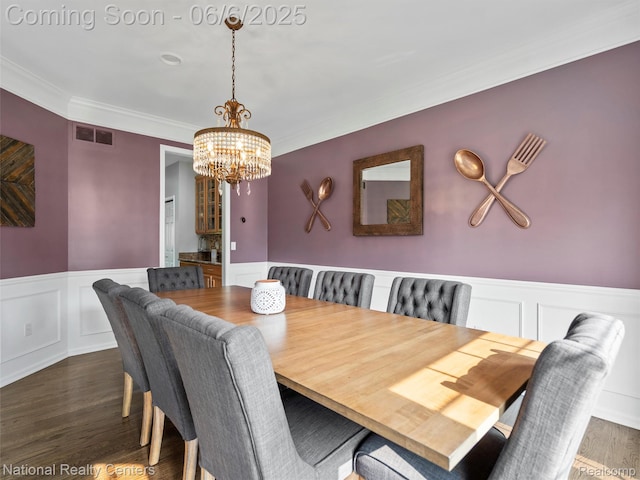 3924 High Grove Way, Lake Orion, MI 48360 - dining room with a chandelier, ornamental molding, a decorative wall, dark wood-style flooring, and wainscoting