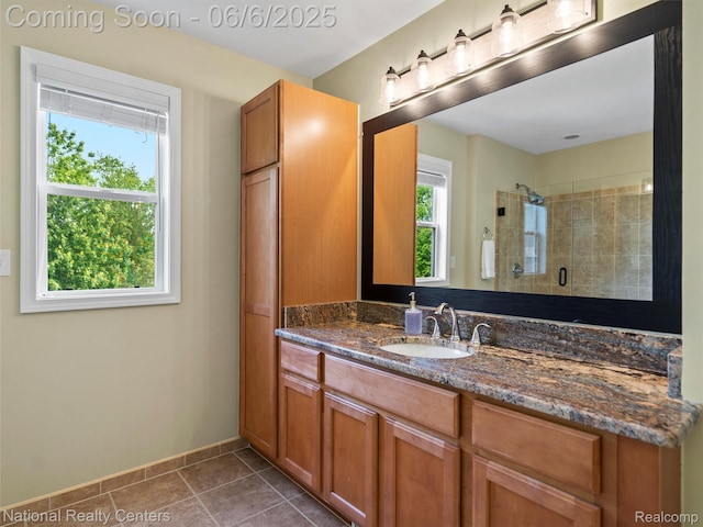 3924 High Grove Way, Lake Orion, MI 48360 - full bathroom featuring vanity, a tile shower, baseboards, and tile patterned floors