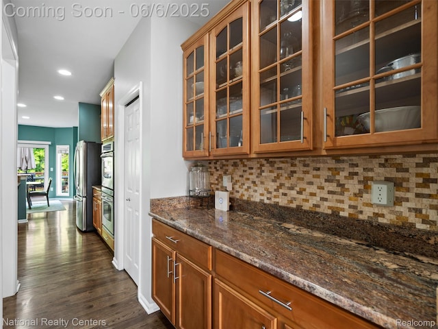 3924 High Grove Way, Lake Orion, MI 48360 - bar with appliances with stainless steel finishes, dark wood-type flooring, tasteful backsplash, and recessed lighting