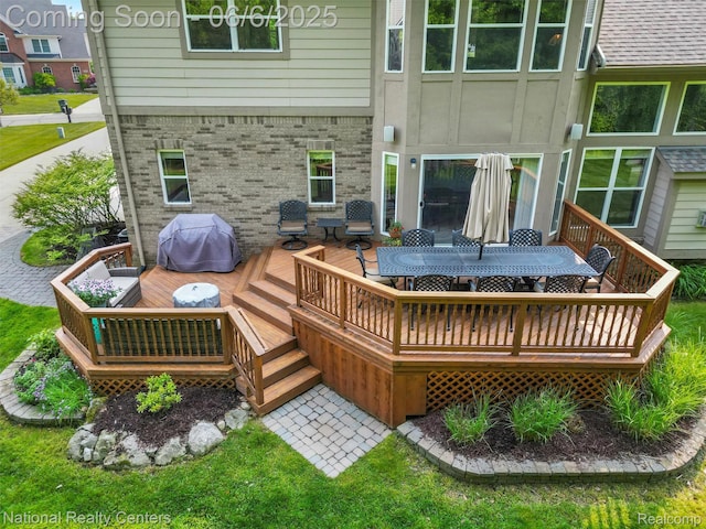 3924 High Grove Way, Lake Orion, MI 48360 - rear view of house with outdoor dining space, a wooden deck, and brick siding