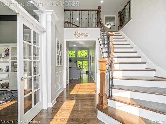 3924 High Grove Way, Lake Orion, MI 48360 - foyer featuring stairway, dark wood finished floors, a high ceiling, french doors, and recessed lighting