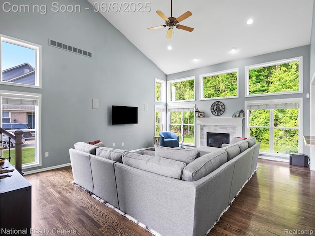 3924 High Grove Way, Lake Orion, MI 48360 - living room featuring high vaulted ceiling, a ceiling fan, a stone fireplace, wood finished floors, and recessed lighting