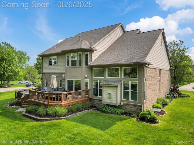 3924 High Grove Way, Lake Orion, MI 48360 - rear view of property featuring a deck, a yard, roof with shingles, and brick siding