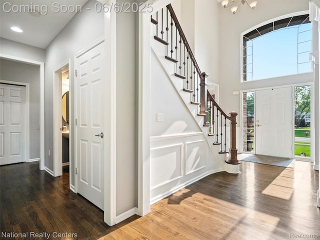 3924 High Grove Way, Lake Orion, MI 48360 - foyer entrance with wood finished floors, stairs, recessed lighting, baseboards, and a high ceiling