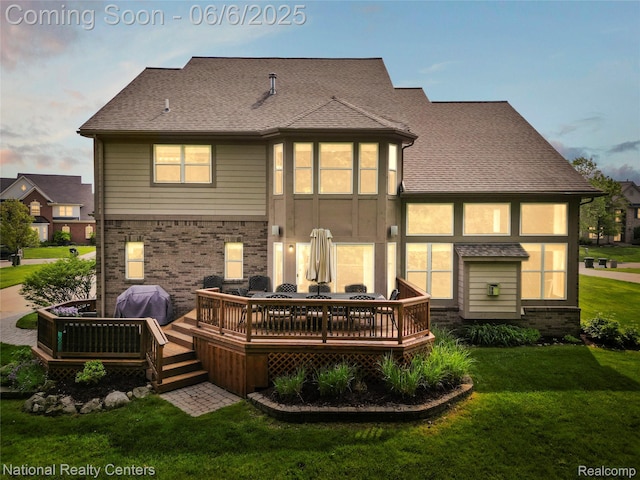 3924 High Grove Way, Lake Orion, MI 48360 - back of property with a wooden deck, a lawn, brick siding, and roof with shingles