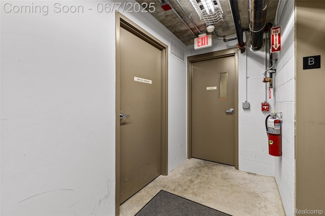 100 W 5th St Unit 504, Royal Oak, MI 48067 - hall featuring unfinished concrete flooring