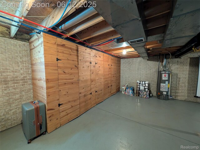 3070 Strong Hts, Grand Blanc, MI 48507 - unfinished below grade area with water heater and brick wall