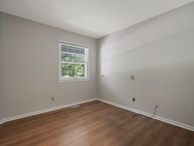 1935 Collegewood St, Ypsilanti, MI 48197 - unfurnished room with wood finished floors and baseboards