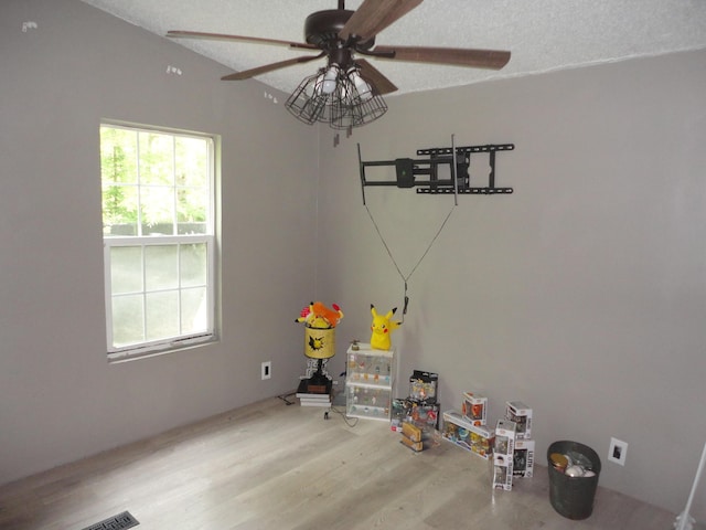 1920 S 15th St, Niles, MI 49120 - unfurnished dining area with plenty of natural light, ceiling fan, a textured ceiling, and wood finished floors