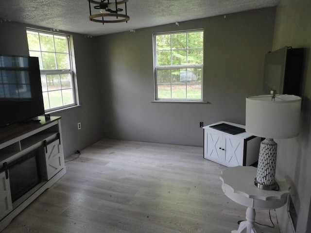 1920 S 15th St, Niles, MI 49120 - unfurnished dining area featuring a textured ceiling and wood finished floors