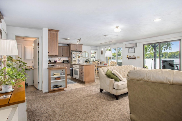 681 Gilead Shores Dr, Bronson, MI 49028 - living area with light carpet and a water view