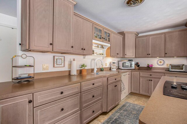681 Gilead Shores Dr, Bronson, MI 49028 - kitchen with a sink, white appliances, light tile patterned floors, glass insert cabinets, and light brown cabinetry