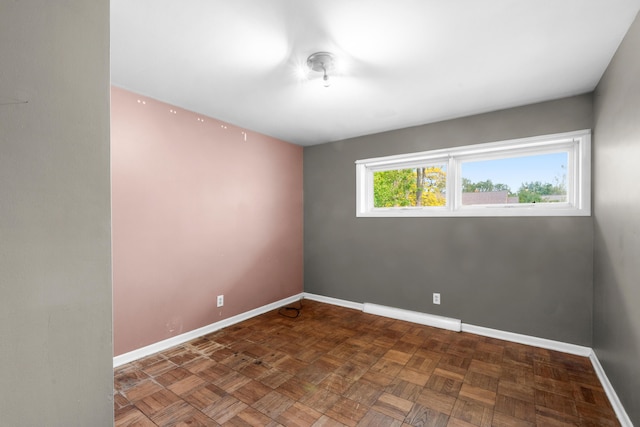 3030 Eastland Rd, Muskegon, MI 49441 - unfurnished room featuring baseboards and baseboard heating