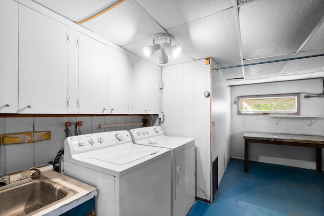 3030 Eastland Rd, Muskegon, MI 49441 - laundry room featuring cabinet space and separate washer and dryer