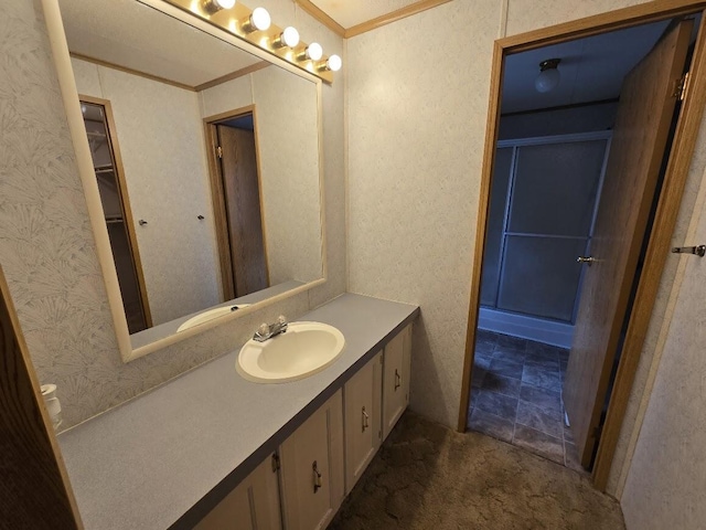 6063 Truman Rd, Barryton, MI 49305 - bathroom with vanity and ornamental molding
