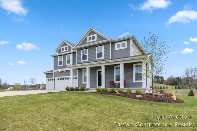 6830 Golden Vw SE, Grand Rapids, MI 49512 - view of front facade with a garage, covered porch, driveway, and a front lawn